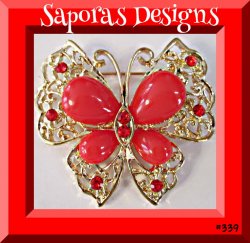 Gold In Color Butterfly Design Brooch With Red Crystals & Red Beads