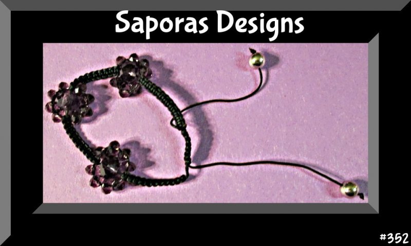 Image 0 of Handmade Black Braided Rope Bracelet With Purple Flower Shaped Beads