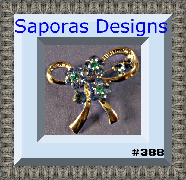 Image 0 of Silver Tone Bow Design Brooch With Blue Crystals