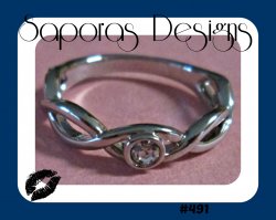 Silver Tone Size 5 Infinity Design Ring With Clear Crystal