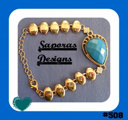 Gold Tone Bracelet With Blue Bead Egyptian Design