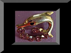 Gold Tone Antique Dolphin Design Brooch With Purple & Black Crystals