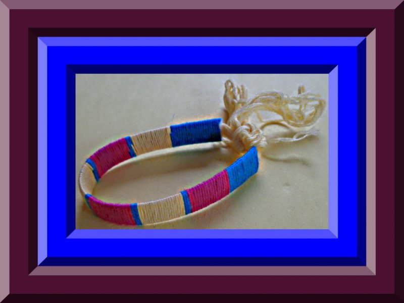 Image 0 of Handmade Handwoven Pink Yellow & Blue In Color Bracelet
