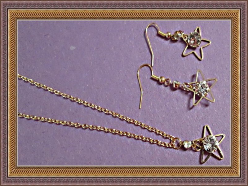 Image 0 of Gold Tone Star With Clear Crystals Dangle Earring & Necklace Jewelry Set