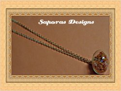 Gold Tone Glass Ball Design Necklace With Orange Stars