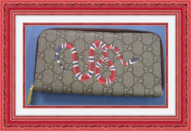 Image 0 of  Brown Long Zippy Leather Wallet With Snake Design Gold Tone Finish