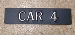 CAR14 Elevator Identification Plate 1 x 4 Black Background/Stainless Character