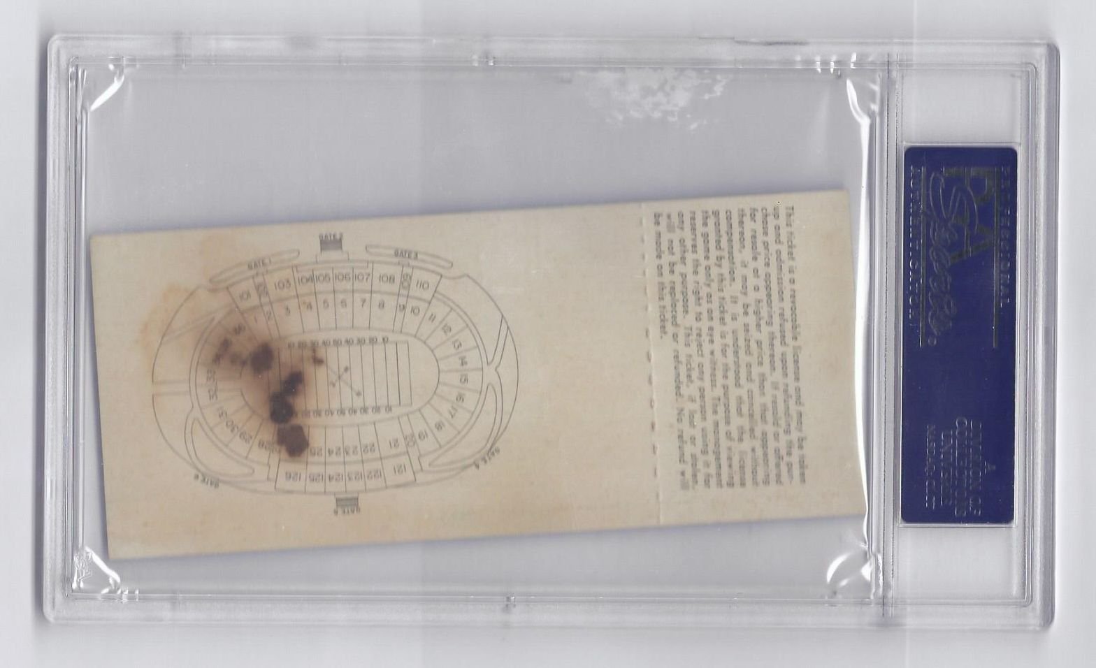 Back of the PSA graded 1959 Cotton Bowl unused ticket showing a dark stain across the printed stadium layout map
