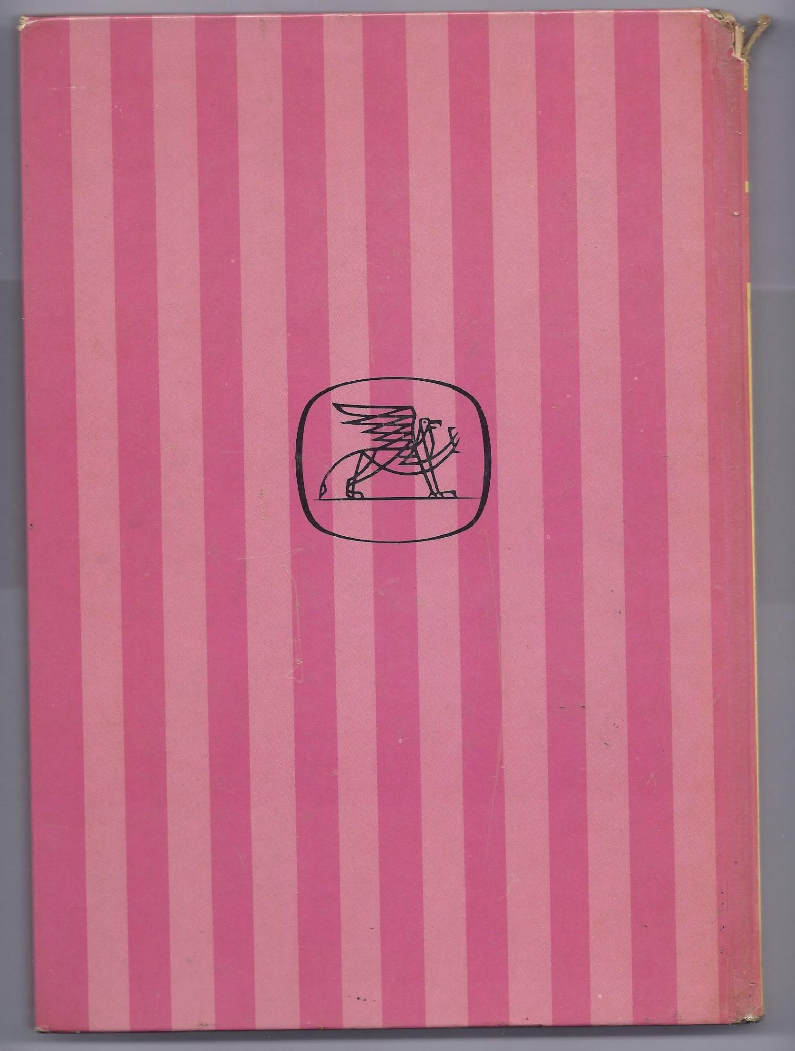 Back cover showing blue vertical stripes and a griffin emblem