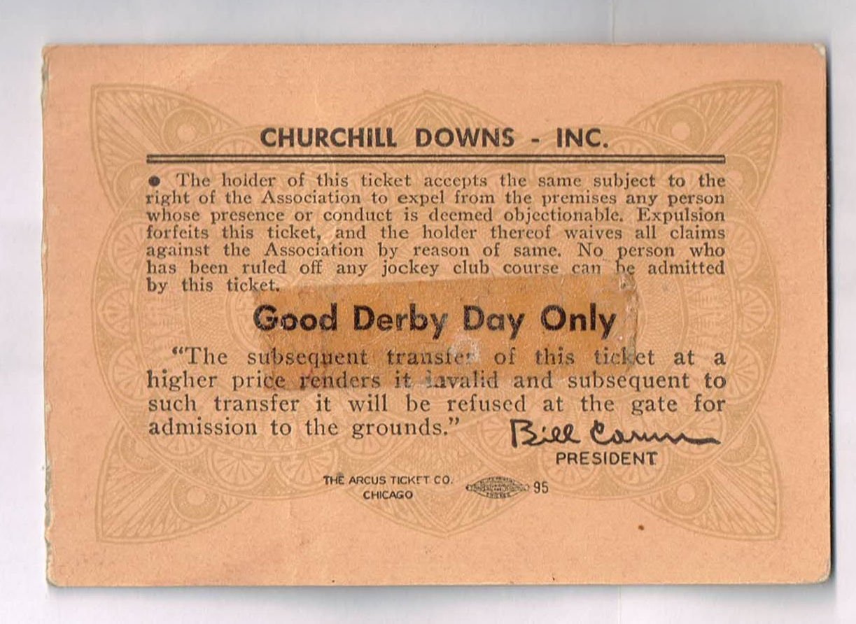 Back of a pink 1952 Kentucky Derby grandstand ticket stub showing Arcus Ticket Co layout and legal disclaimer text with an uneven torn right edge
