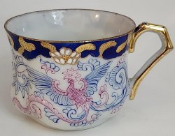 Oriental Petite Teacup colored in Pink Blue Wings Heavy Gold Trim Accent Vintage