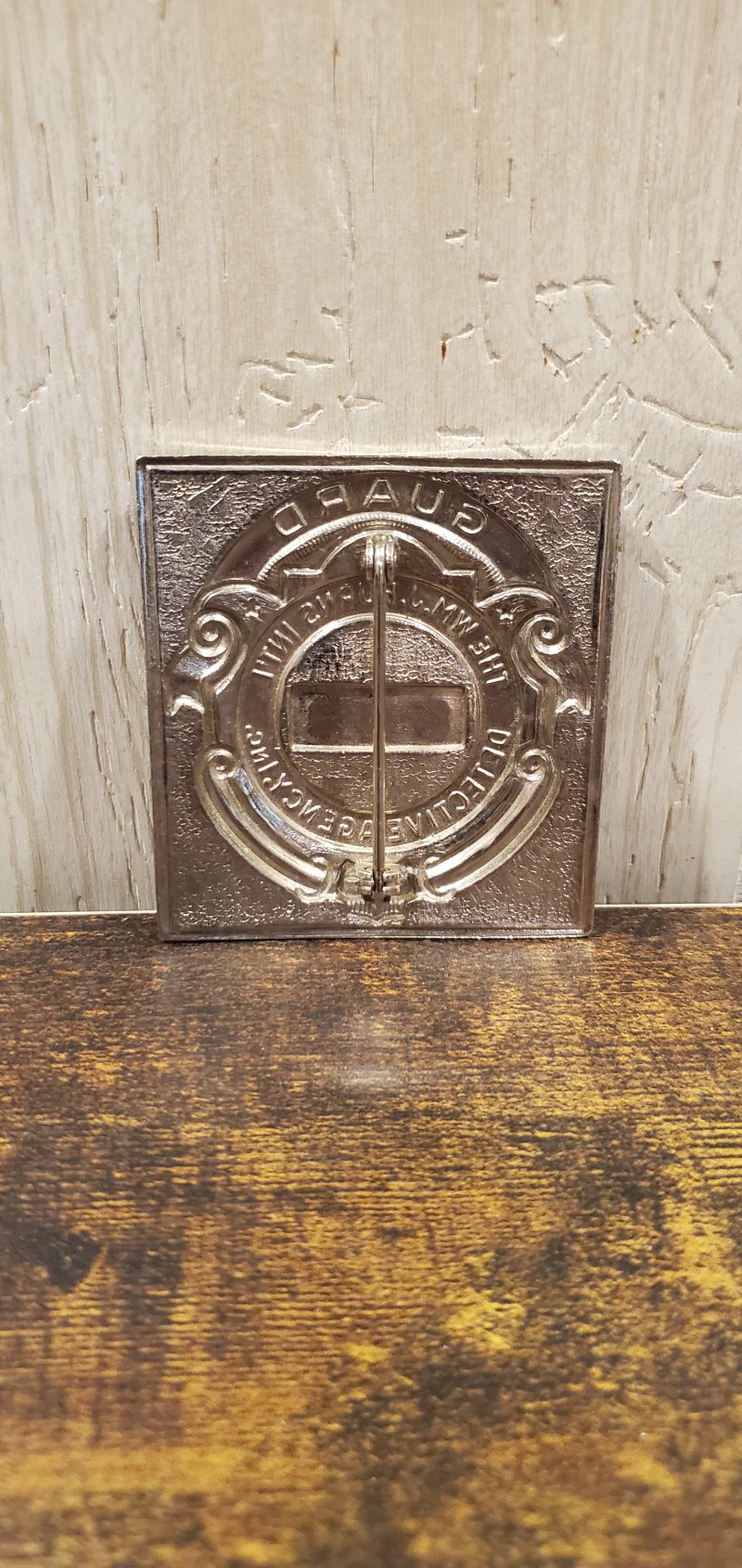 Image 1 of WM. J. BURNS INT. DETECTIVE AGENCY GUARD SQUARE BADGE (33334)