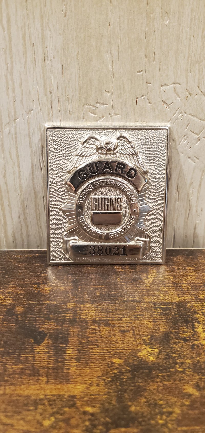 Image 0 of BURNS INTERNATIONAL SECURITY SERVICES INC GUARD SQUARE BADGE (38021)