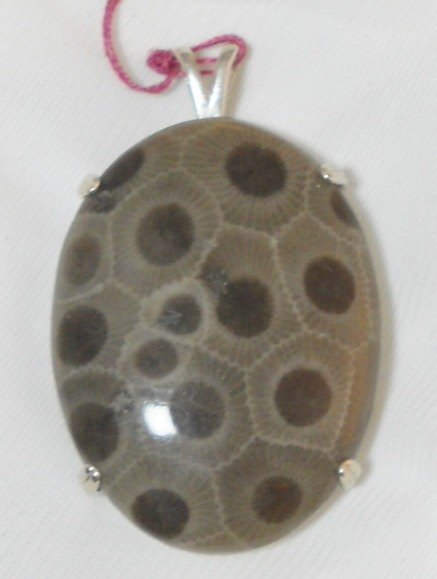 30 x 40 mm Cabochon in sterling silver mount.