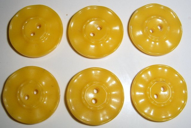 Yellow buttons, Plastic buttons