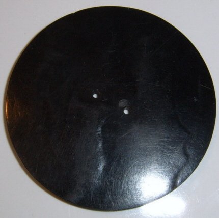 Image 1 of Large Black Carved Coat Button