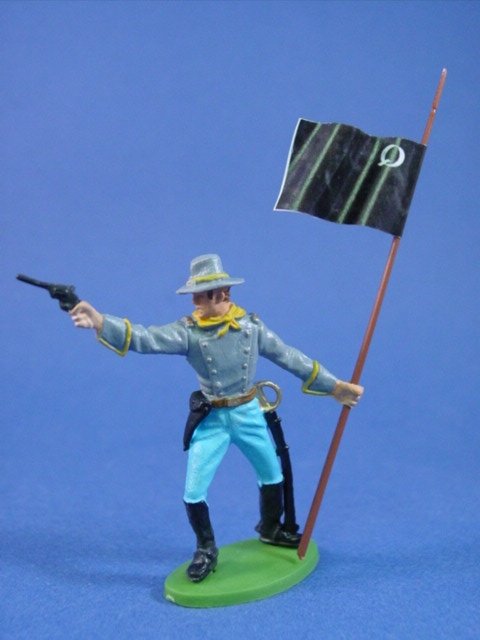Britains Herald DSG Confederate toy soldiers custom cavalry officer with Quantrill's Raiders guidon. Figure is hand painted and attached to a plastic base.