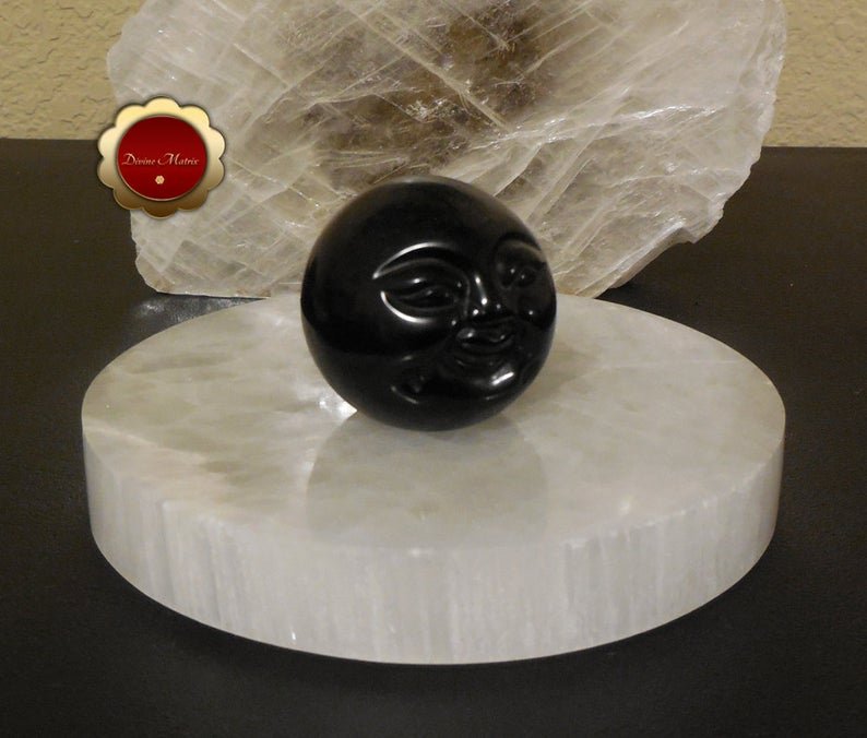Image 1 of 50mm Black Obsidian Sphere Carved Moon Face Psychic Protection Stone