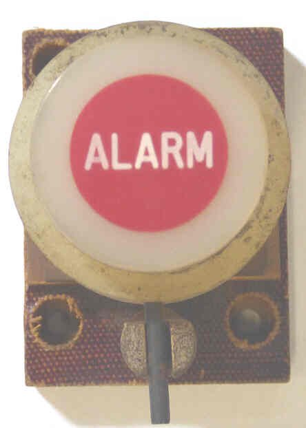 BUTTON, ASSEMBLY, NON-ILLUMINATED, RED, MARKED ALARM IN WHITE, VERTICAL VINTAGE 