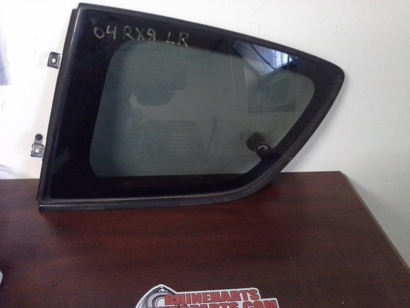 Rx8-Rear door glass driver side  000967