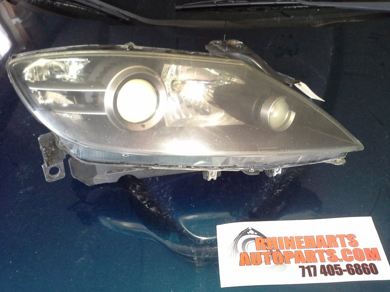 04-08 rx8 non hid headlight passenger side